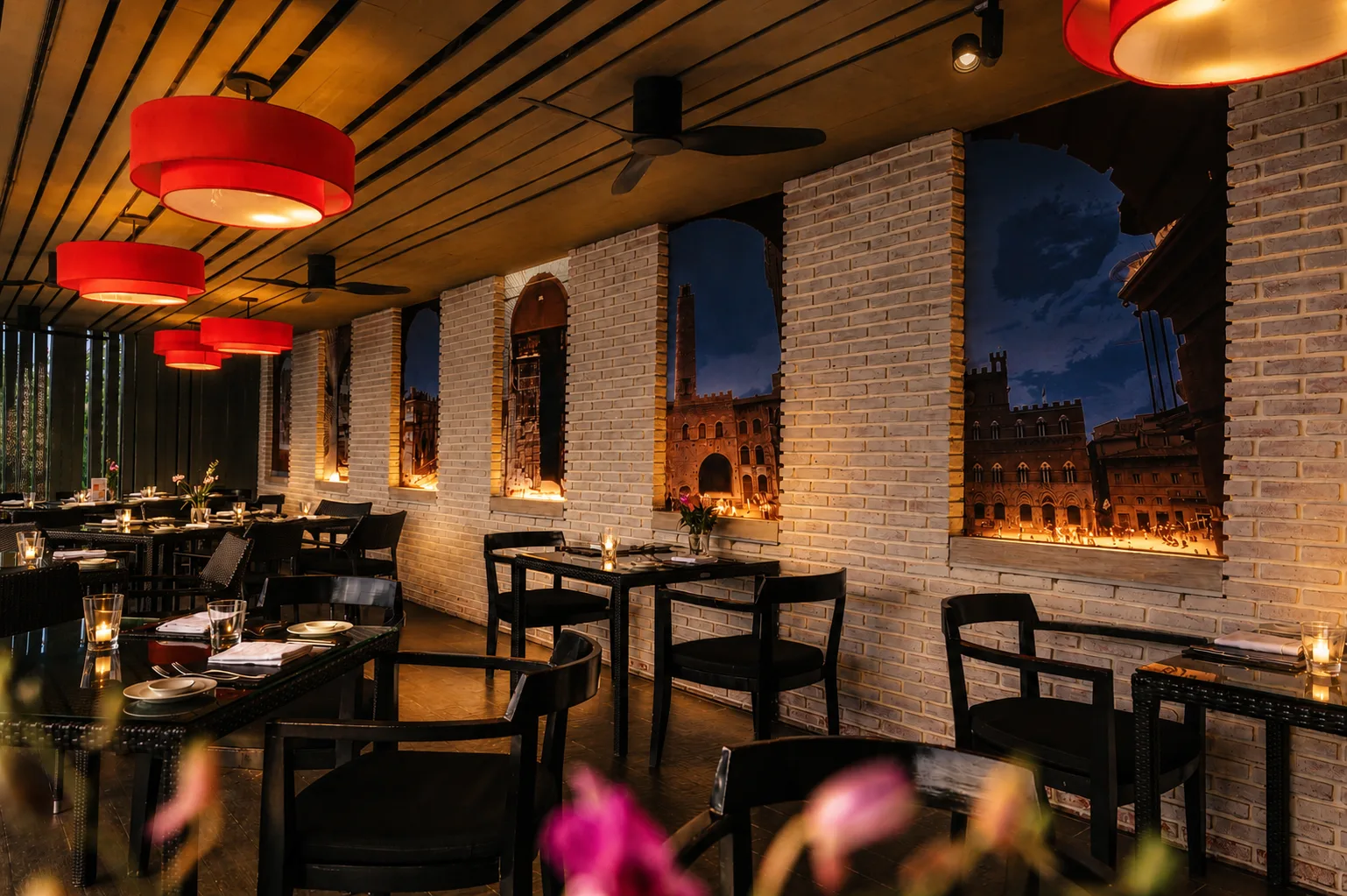 La Gritta dining room with signature red pendant lamps
